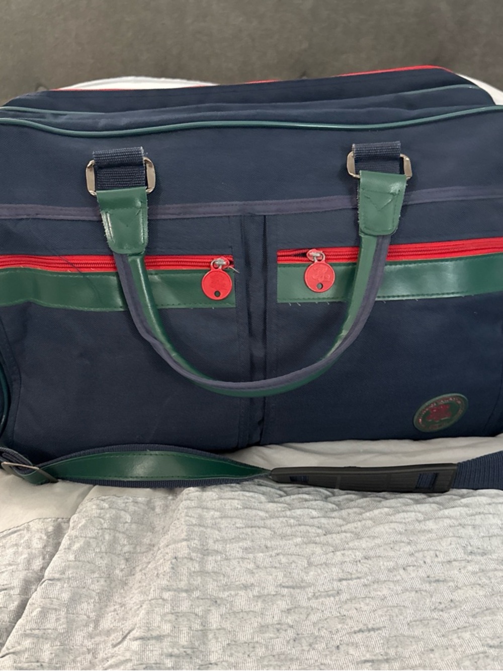 Navy and Green Travel Duffel Bag with Red Accents